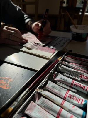Photo of a child painting at the McConnell Arts Center in Central Ohio.
